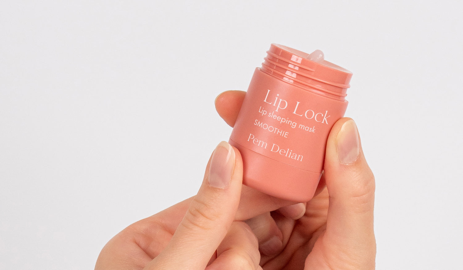 Pem Delian Lip Lock Smoothie éjszakai ajakápoló maszk ujjak között eltekerve