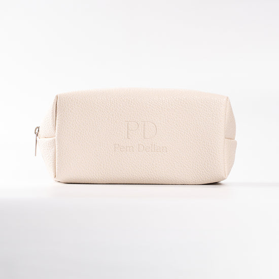 Pem Delian beige neszesszer fehér háttérrel