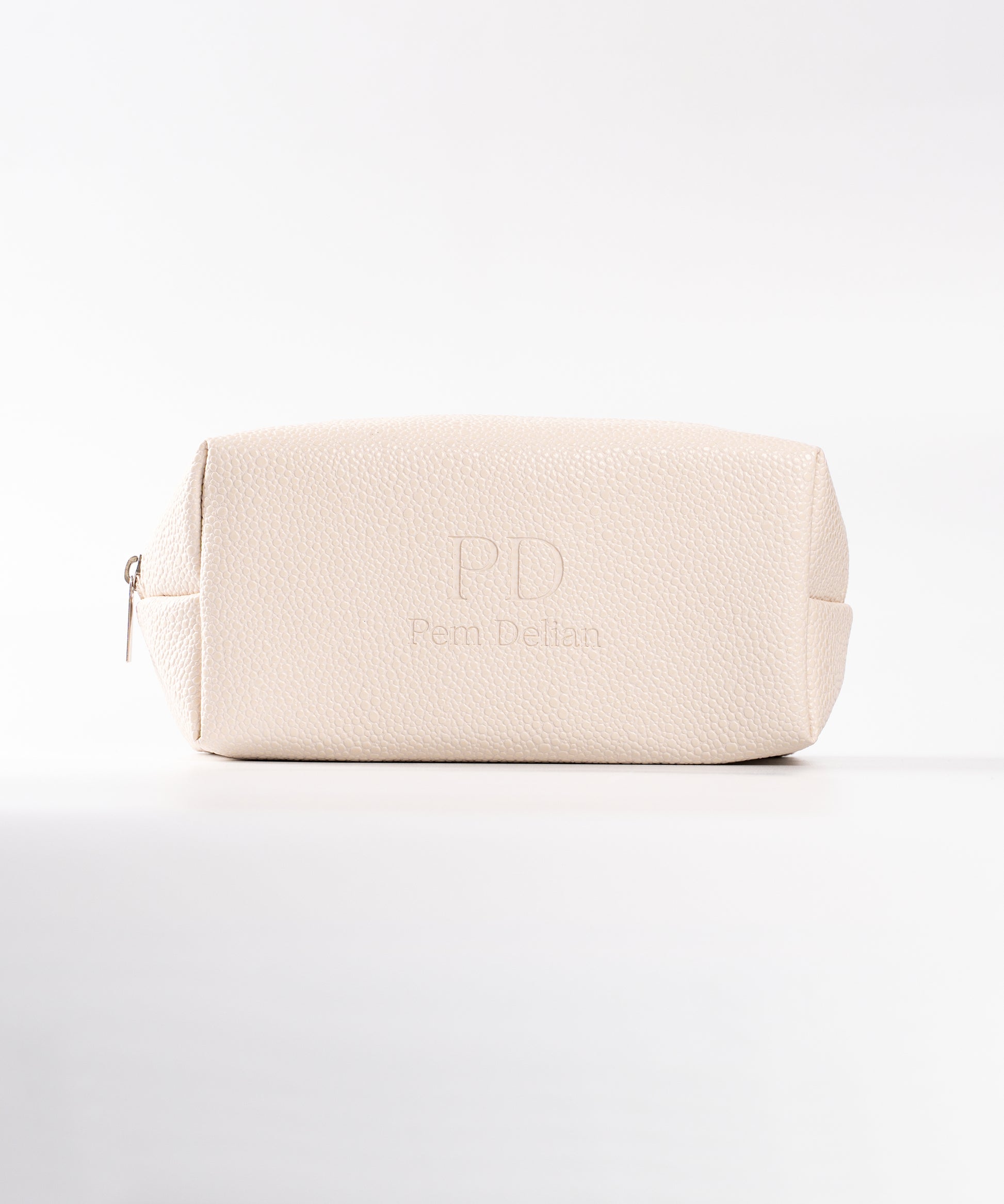 Pem Delian beige neszesszer fehér háttérrel