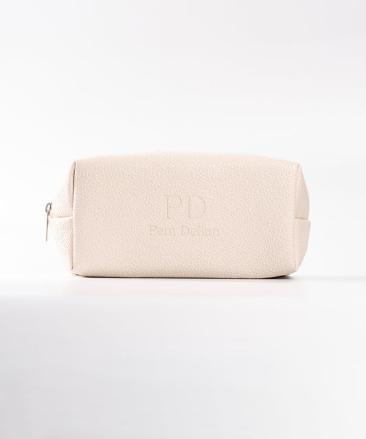 Pem Delian beige neszesszer fehér háttérrel