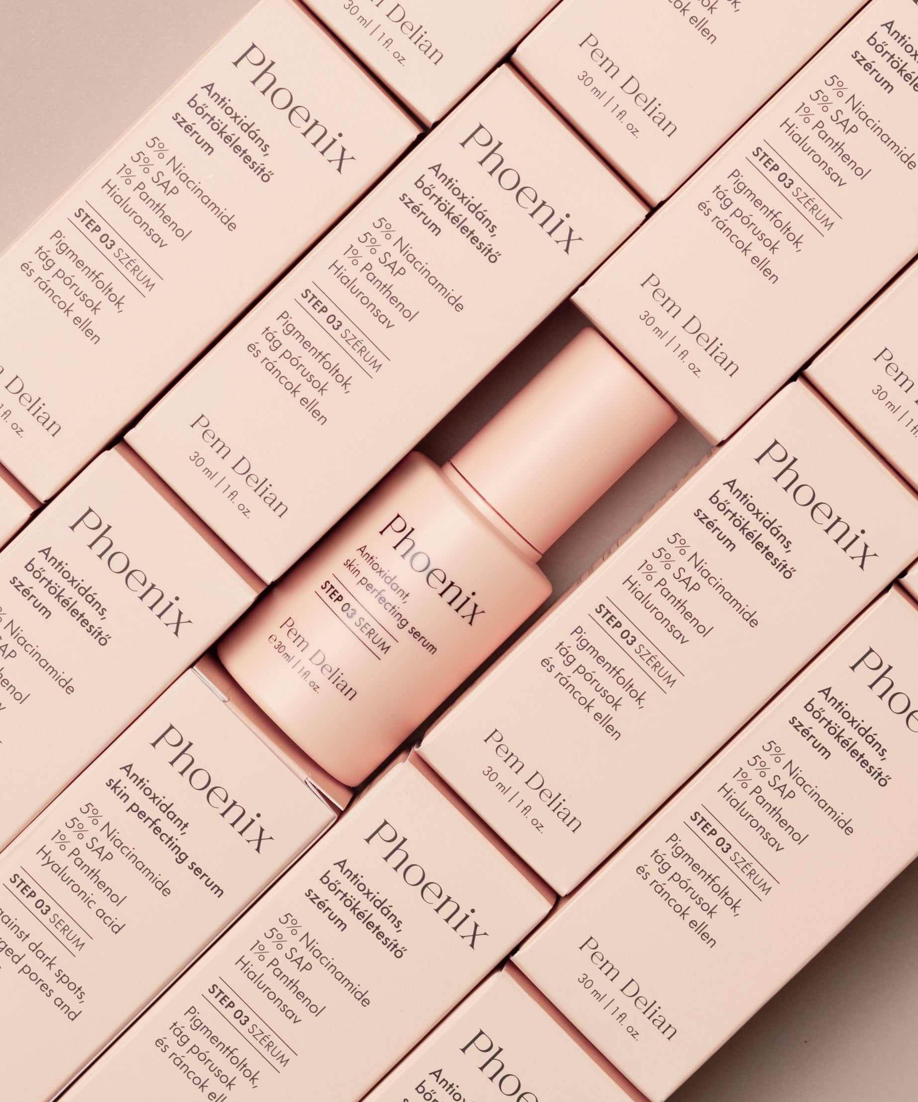 Pem Delian Phoenix antioxidáns, bőrtökéletesítő szérum, mellette dobozok